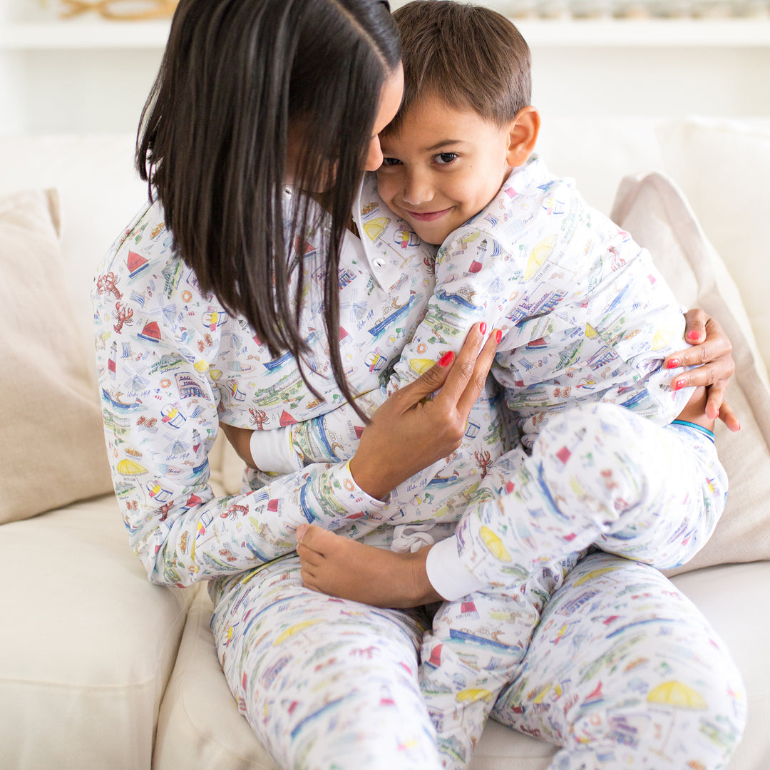 Mom and child in their pima cotton pajamas on zofa.