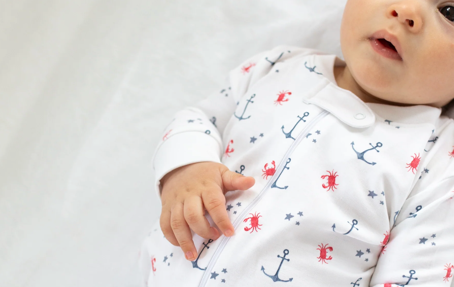 baby in nautical romper