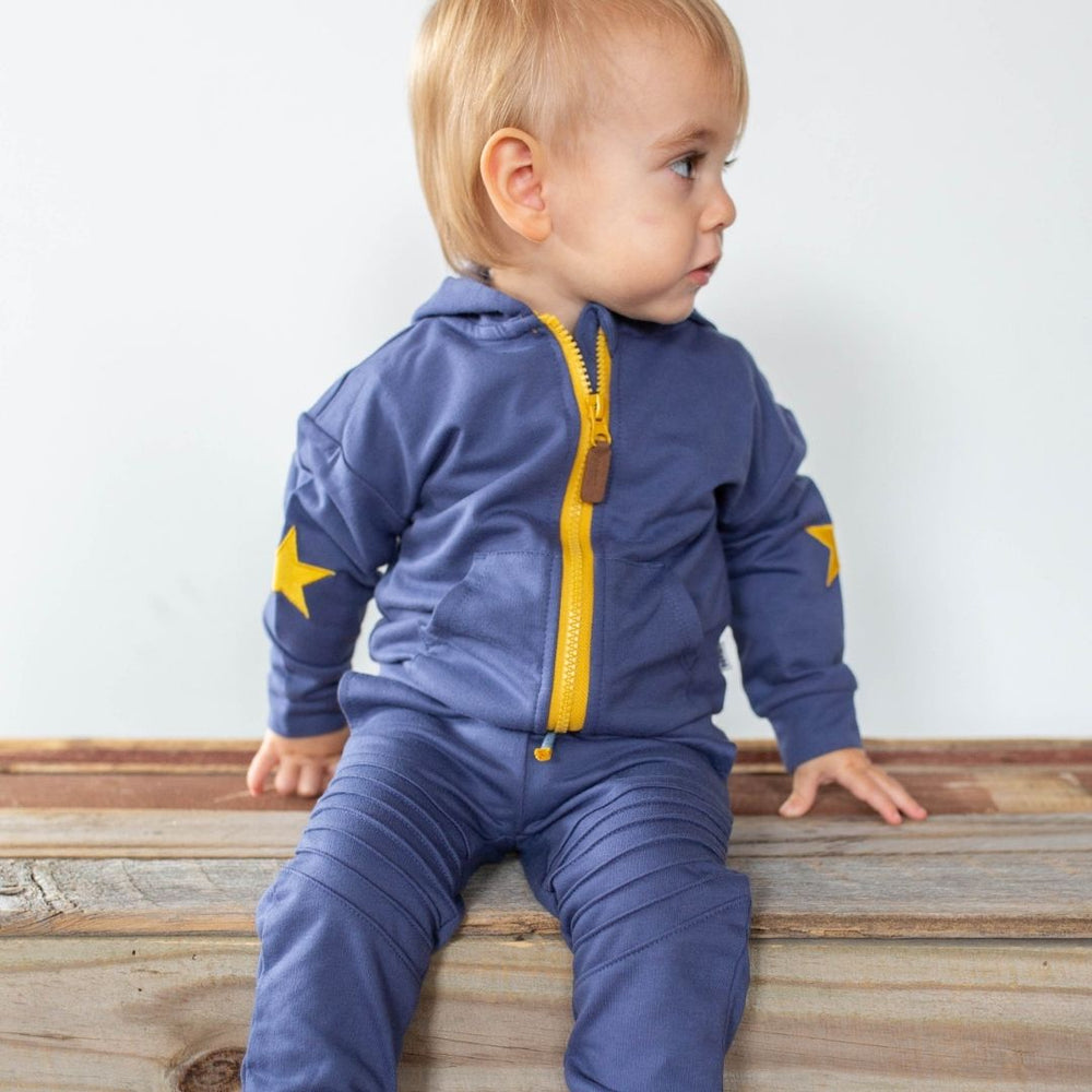 baby wearing dash sweatsuit