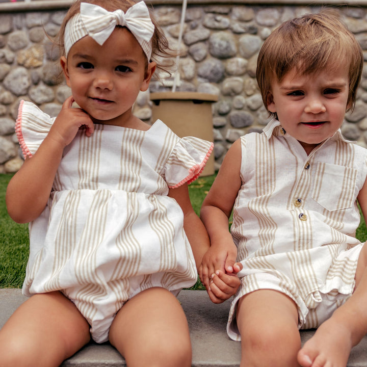 Linen outfits on baby girl and boy