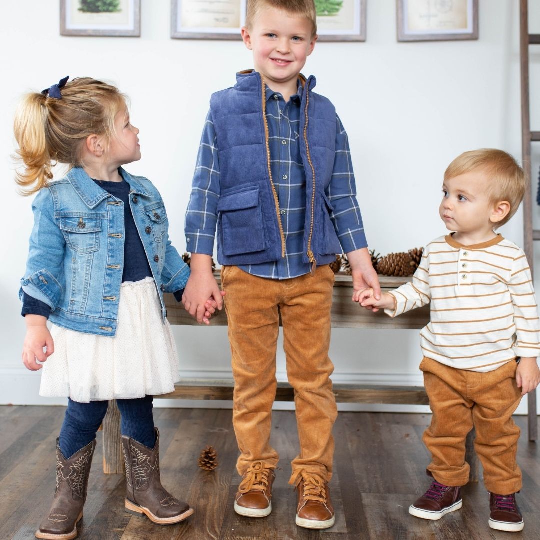 boy wearing joey vest with kids