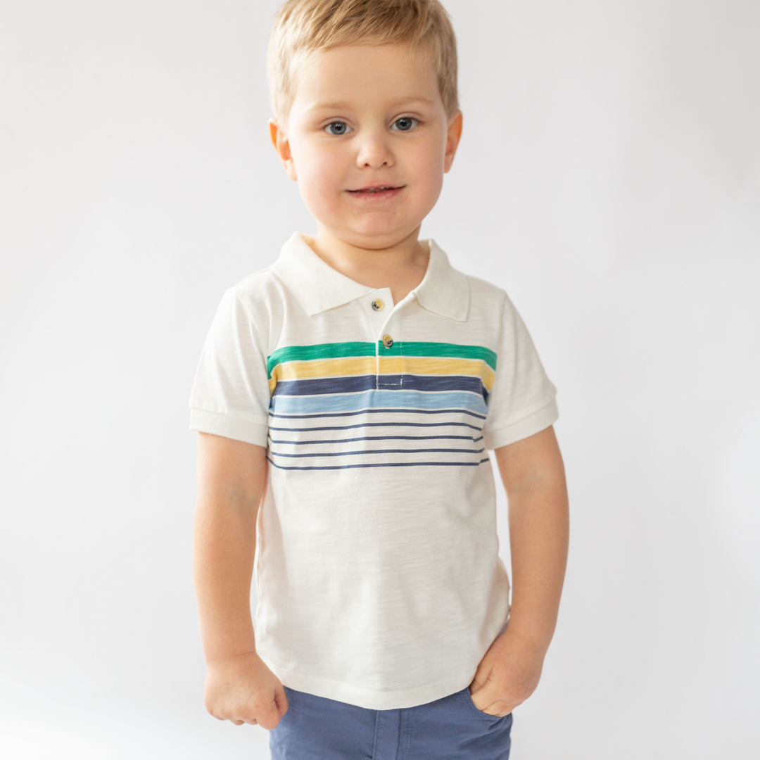 a little boy wearing Andrew Polo in Cool Multi Stripe