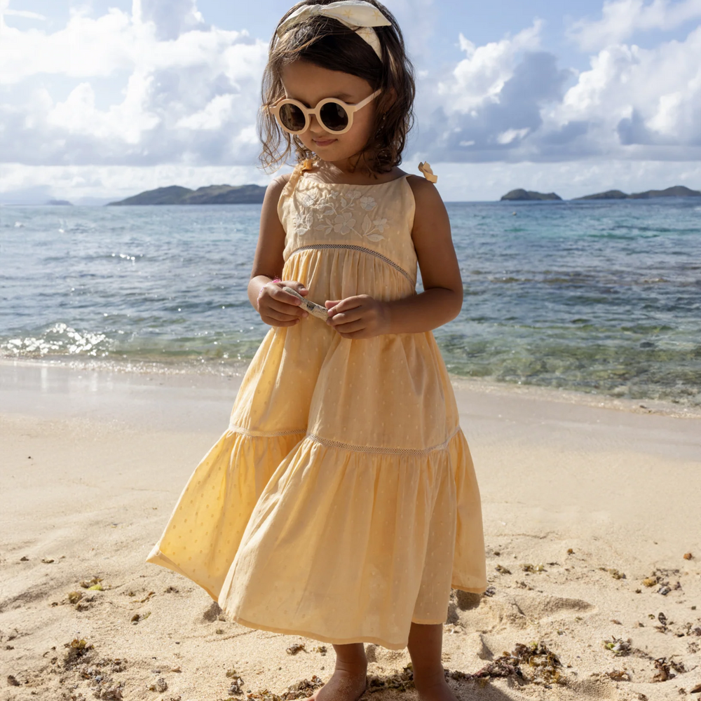 a girl wearing Alice Dress in Vanilla