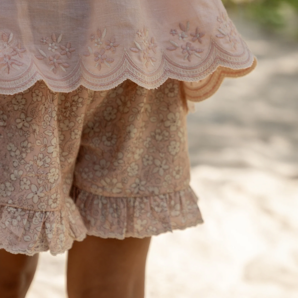 a girl wearing Ambroise Shorts in Garden Flowers