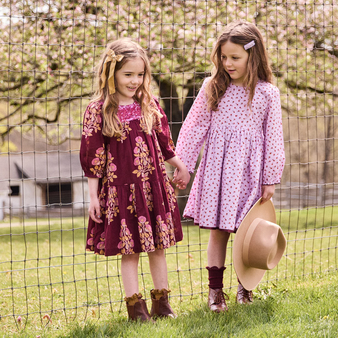 a girl wearing Amma Dress - Lavender Tiny Roses