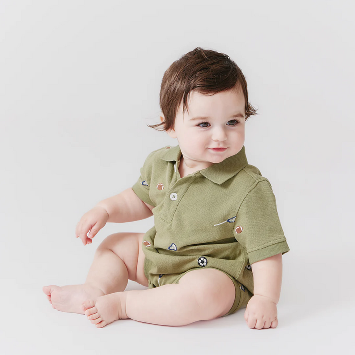 a baby boy wearing Baby Alec Jumper - Sports Embroidery