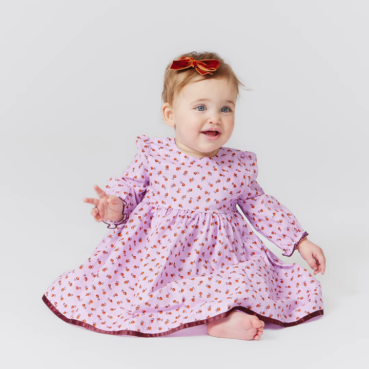 a baby wearing Baby Amma Dress Set - Lavender Tiny Roses