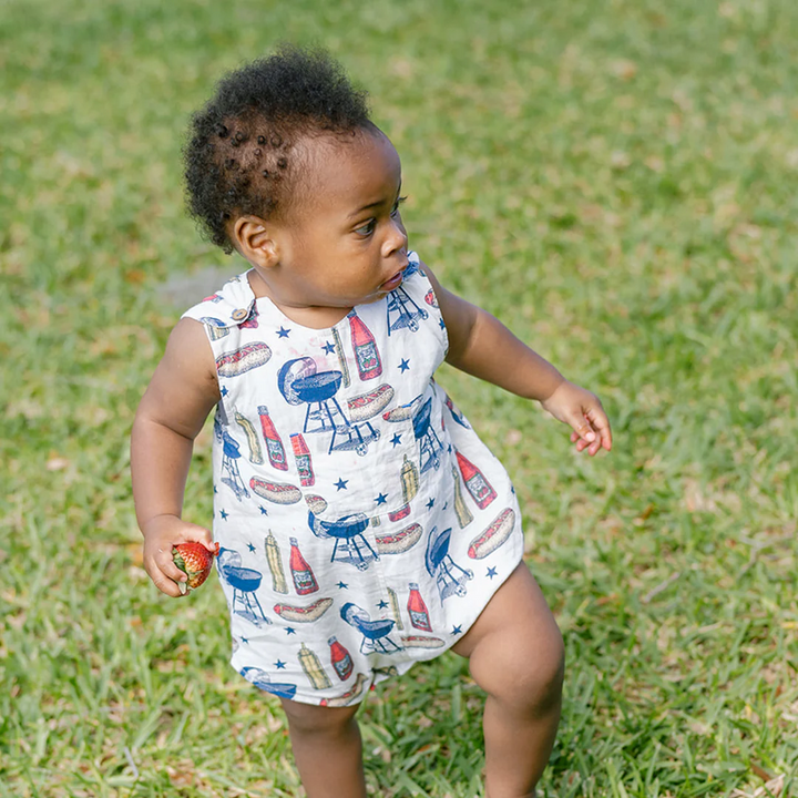 a baby boy wearing Baby Noah Jumper - Grilling Out