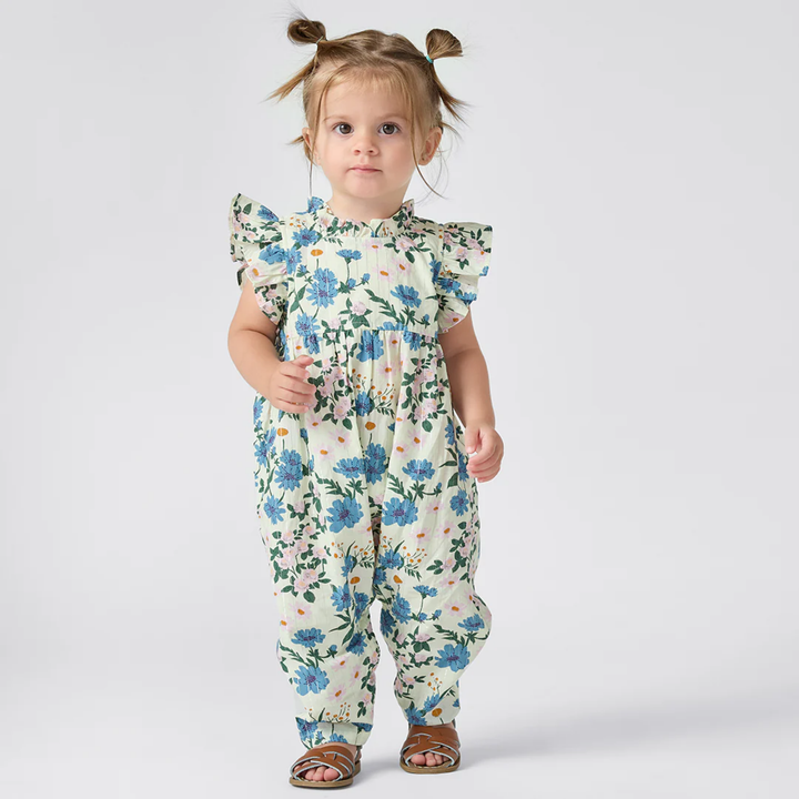 a baby wearing Baby Jennifer Jumper - Melon Daisy Floral