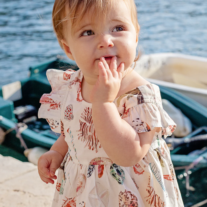 a baby wearing Baby Liv Dress Set - Watercolor Shells