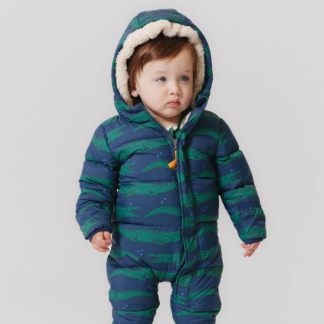 a baby wearing Baby Snowsuit - Crocodiles