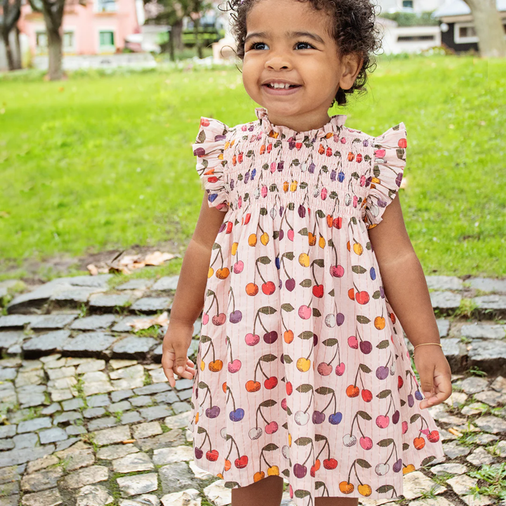 a baby wearing Baby Stevie Dress Set - Cloud Pink Cherry