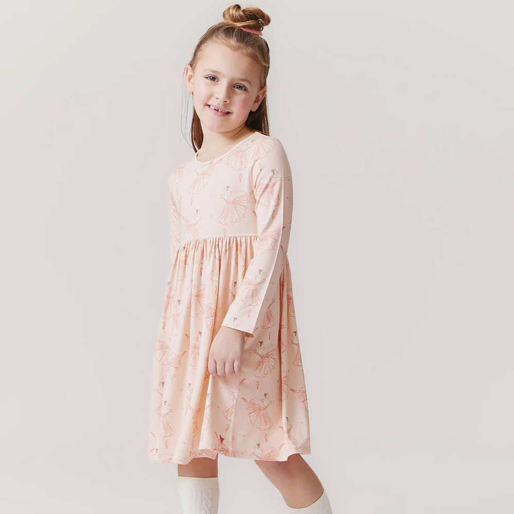 a little girl wearing Bamboo Steph Dress - Pink Ballerinas