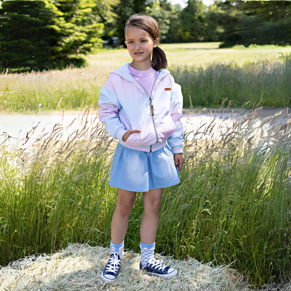 Beau Gradient Summer Jacket in Cotton Candy a girl standing on a grass