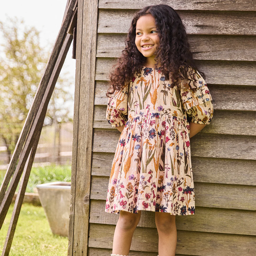 a girl wearing Brooke Dress - Autumn Flowers