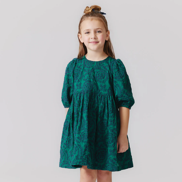 a girl wearing Brooke Dress - Evergreen Blooming Embroidery