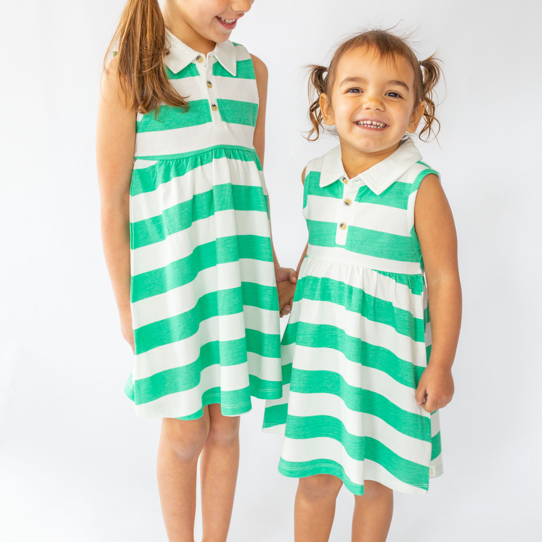 two little girls wearing Brooke Dress in Marine Green Rugby Stripe