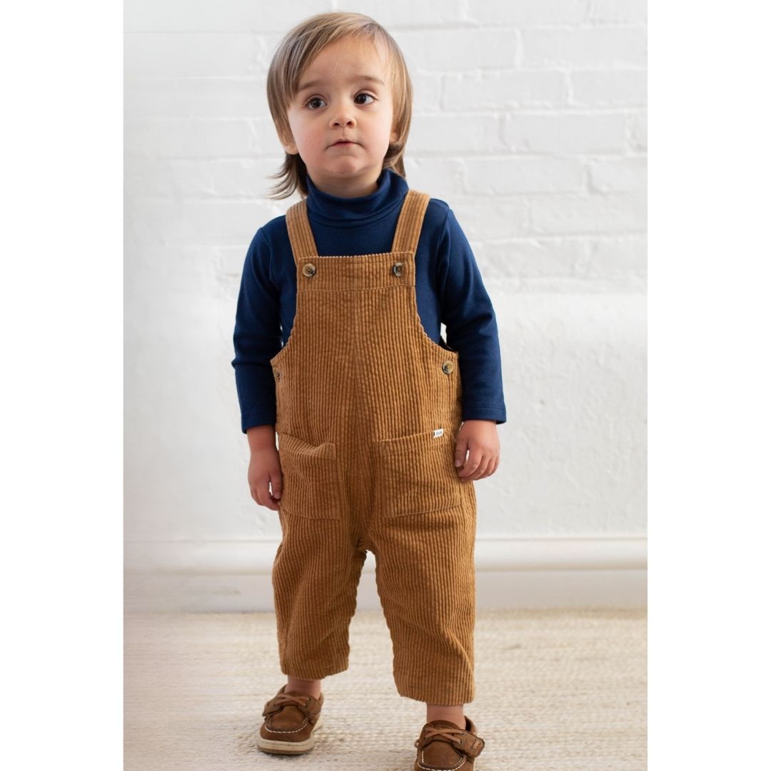 brown cord overalls on boy