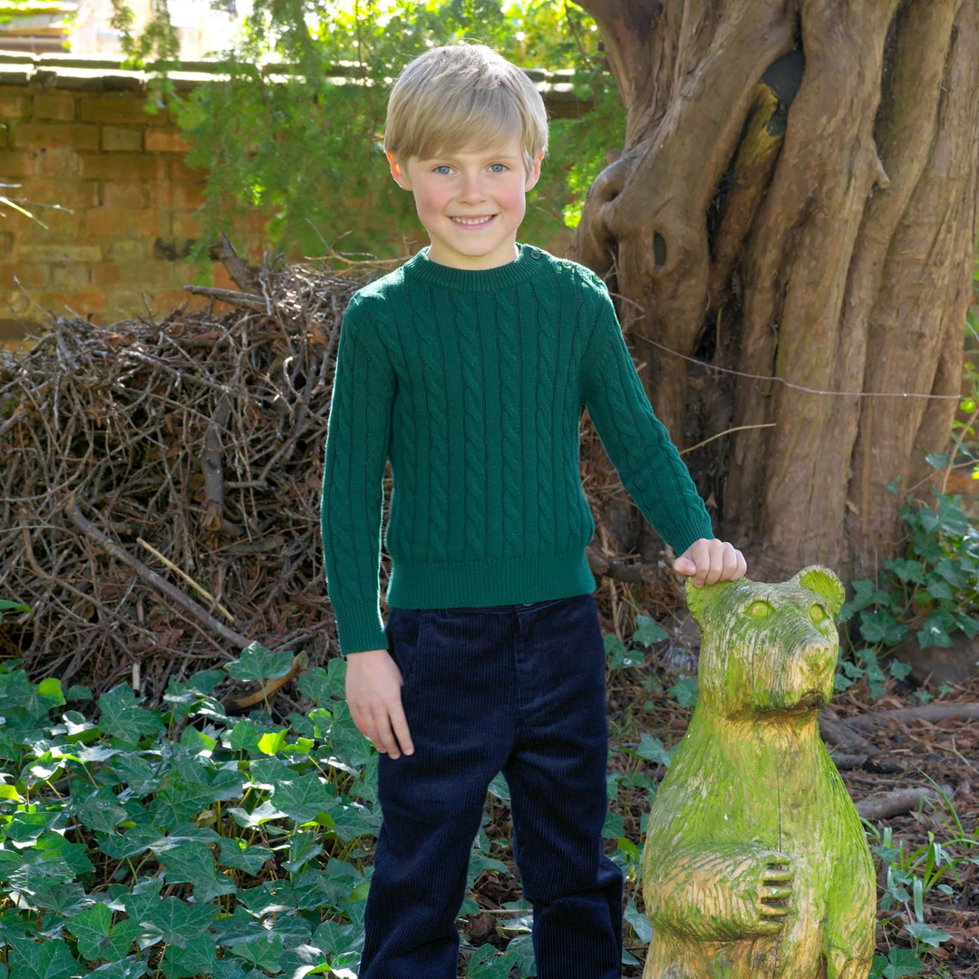 a boy wearing Cable Knit Sweater in Green