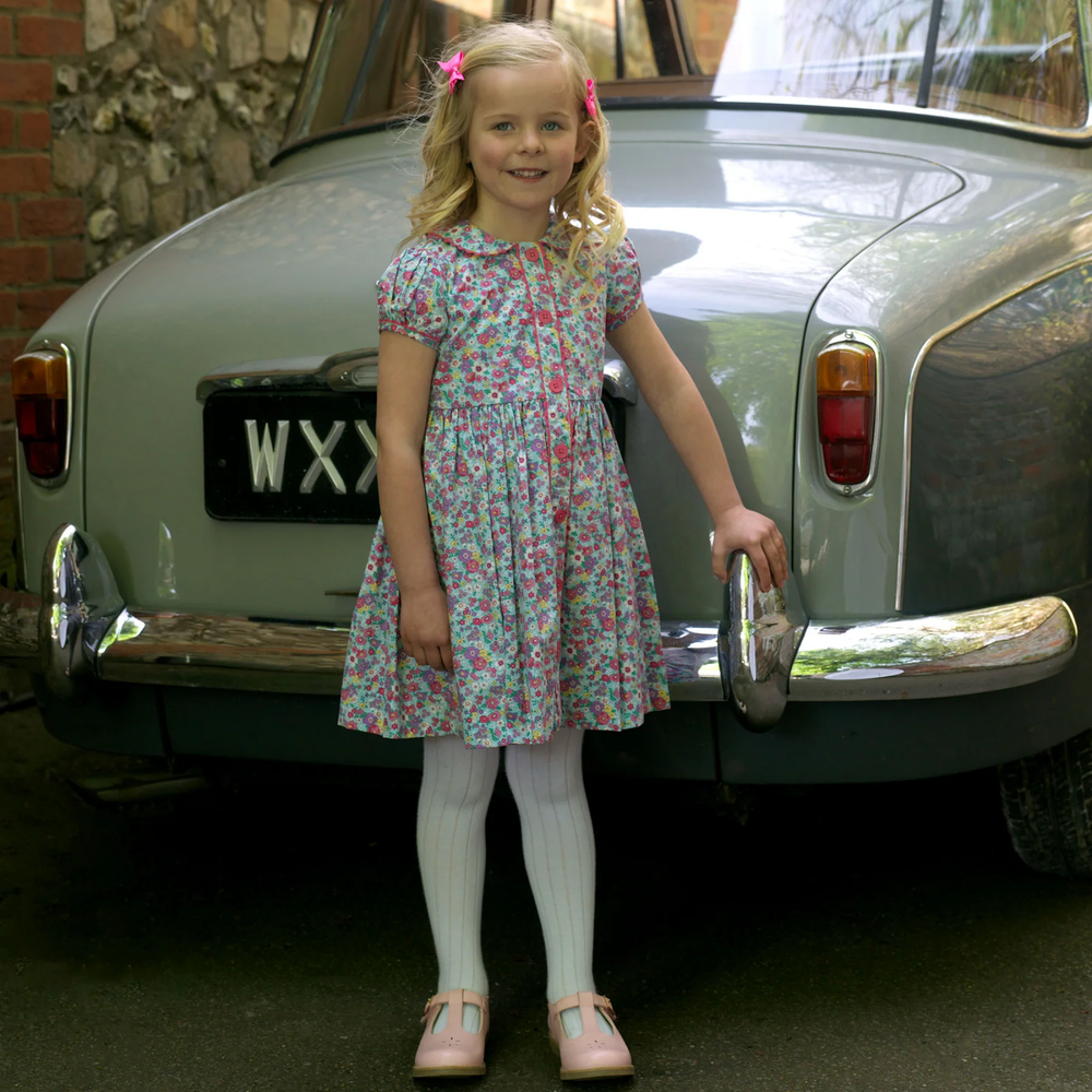 a girl wearing Candy Floral Button-Front Dress