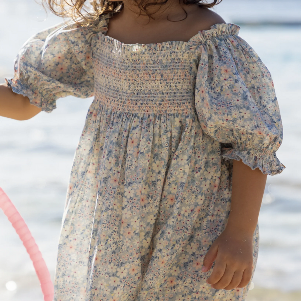 a girl wearing Caroline Dress in Amelia Print