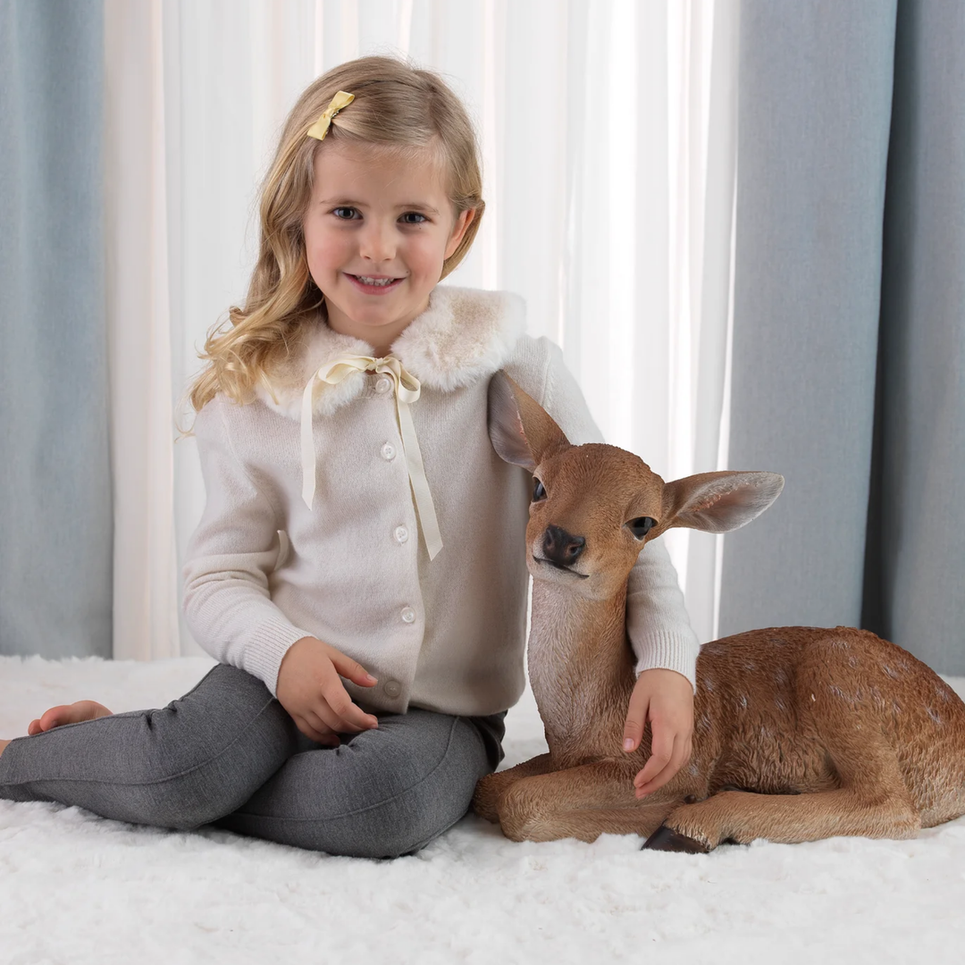 a little girl wearing Cashmere Cardigan in Ivory