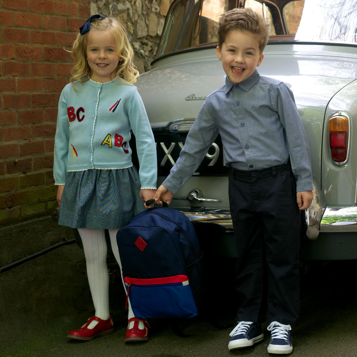 a girl wearing Chambray Pull on Skirt in Navy