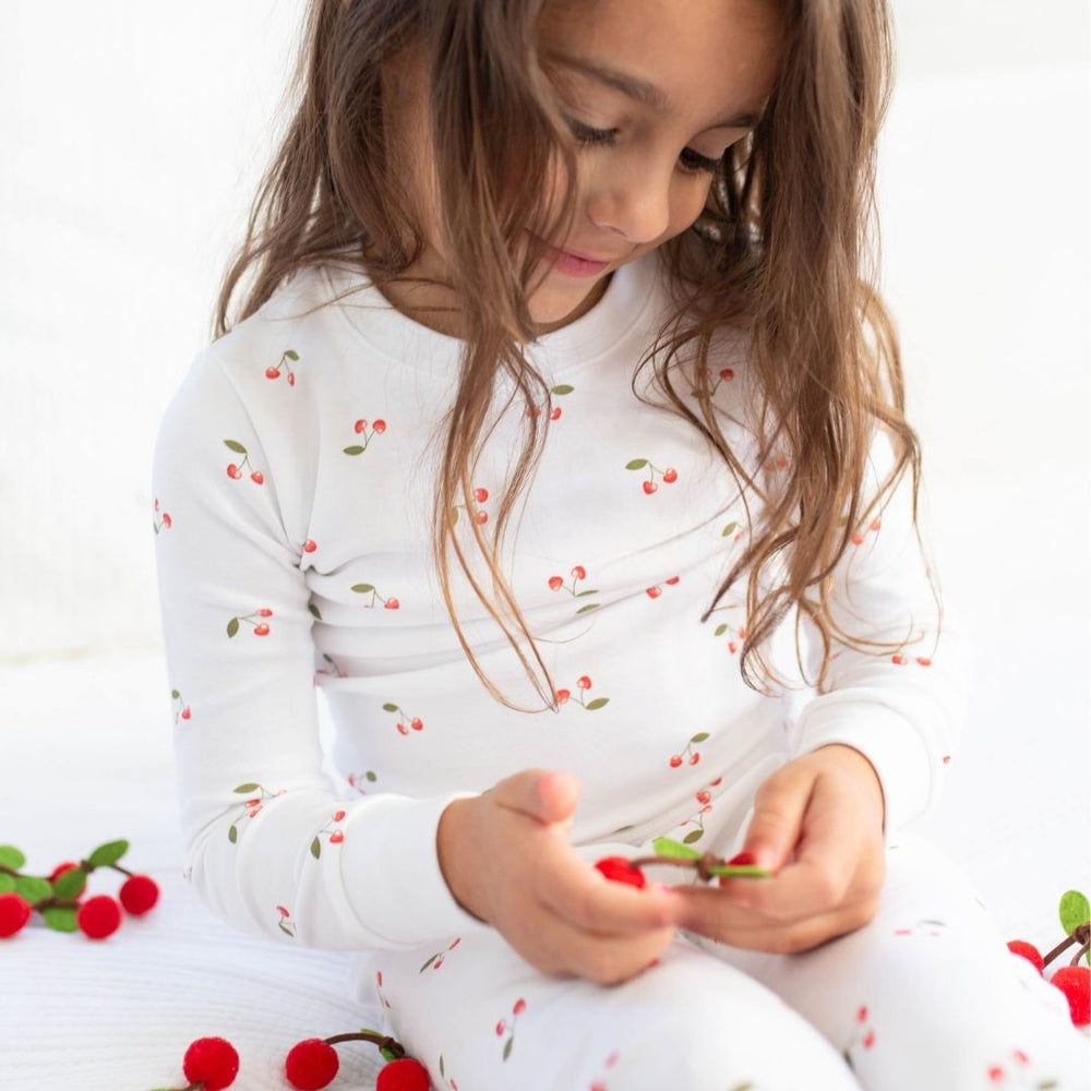 a girl wearing Cherry Pajama Set