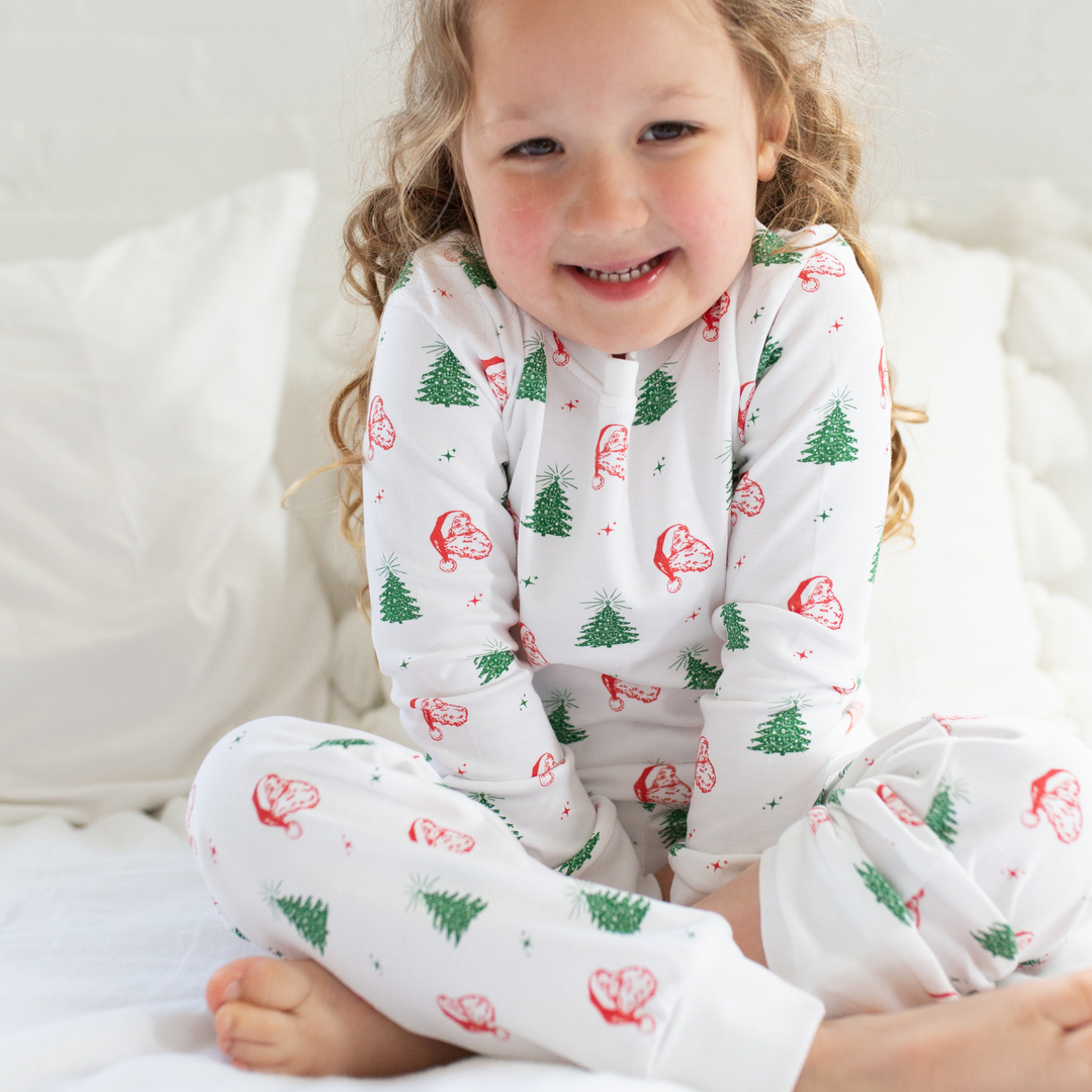 a little girl wearing Classic Christmas Pajama Set