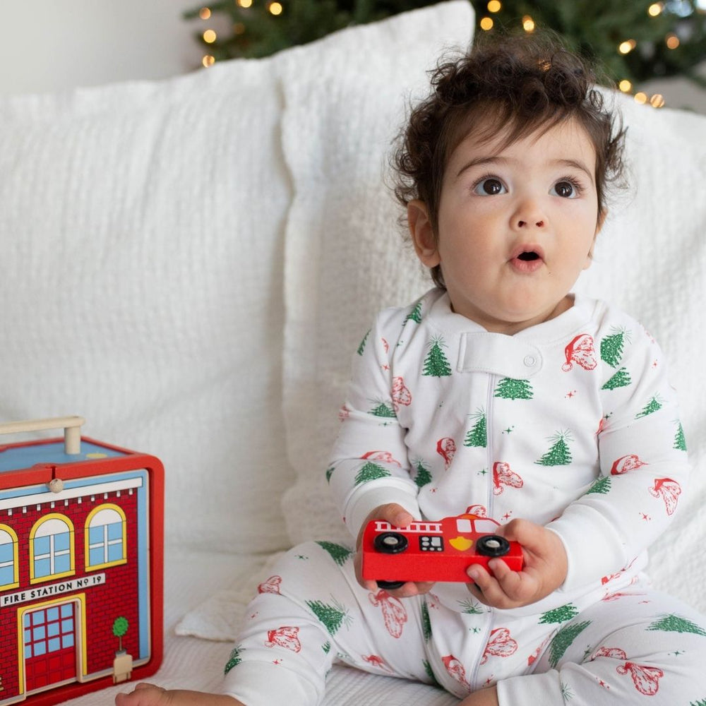 a baby wearing Classic Christmas Zipper Romper