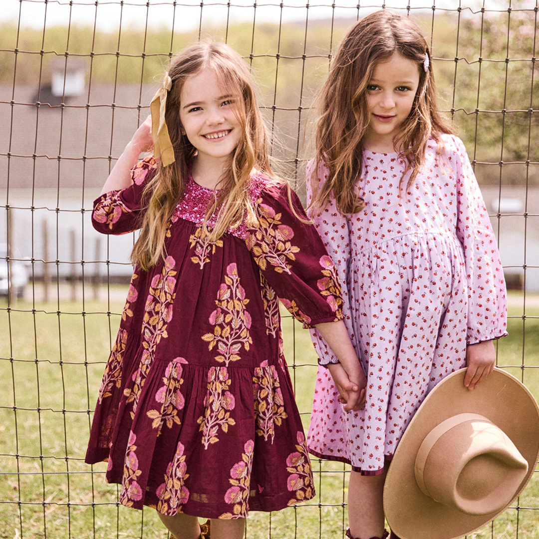 a girl wearing Fiona Dress - Burgundy Bouquet Floral