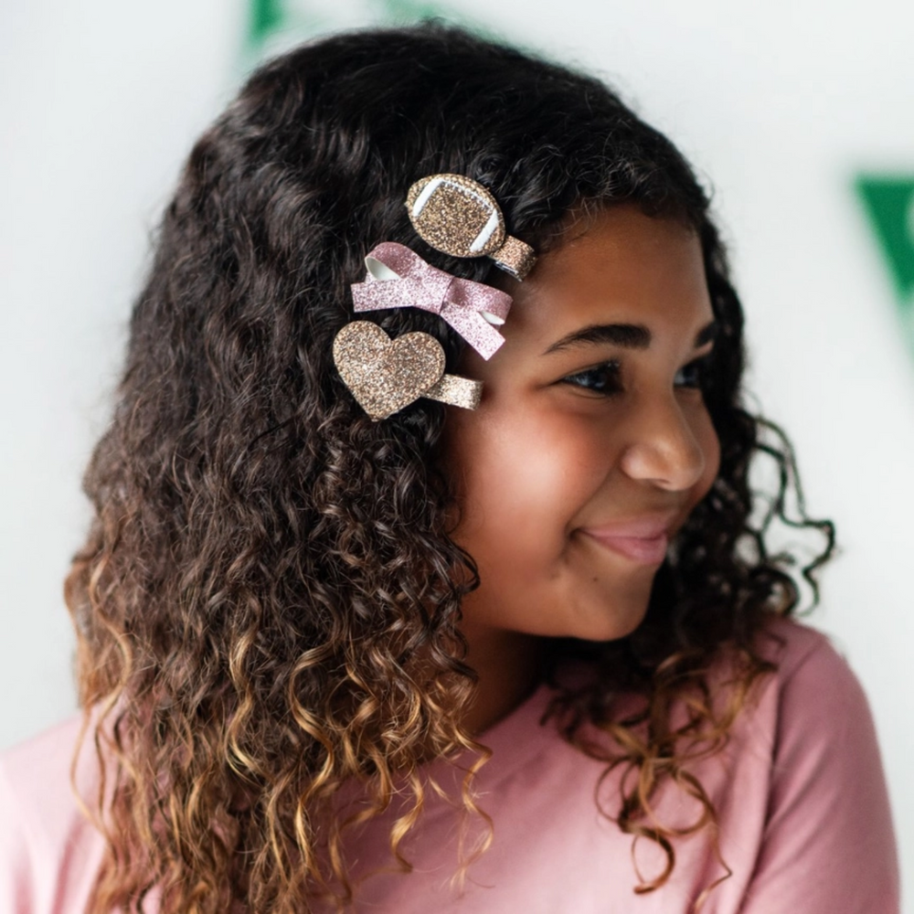 a girl wearing Football Love Clip Set 