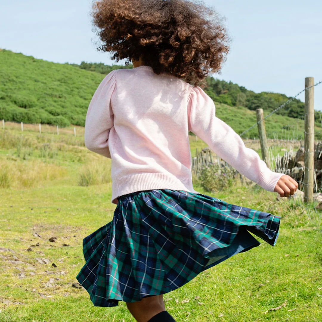 a girl wearing Gianna Skirt - Green Tartan