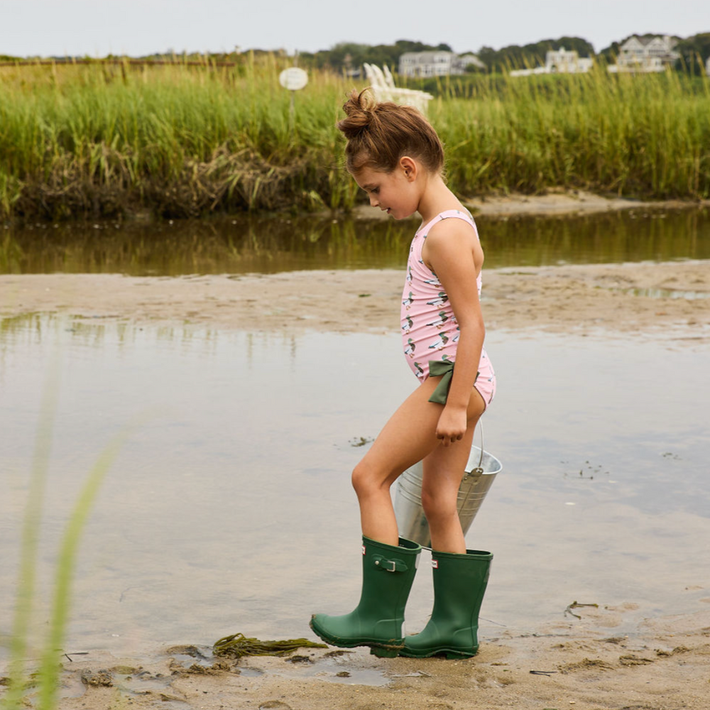 Sutton Suit - Pink Mallard Friends a girl holding a bucket