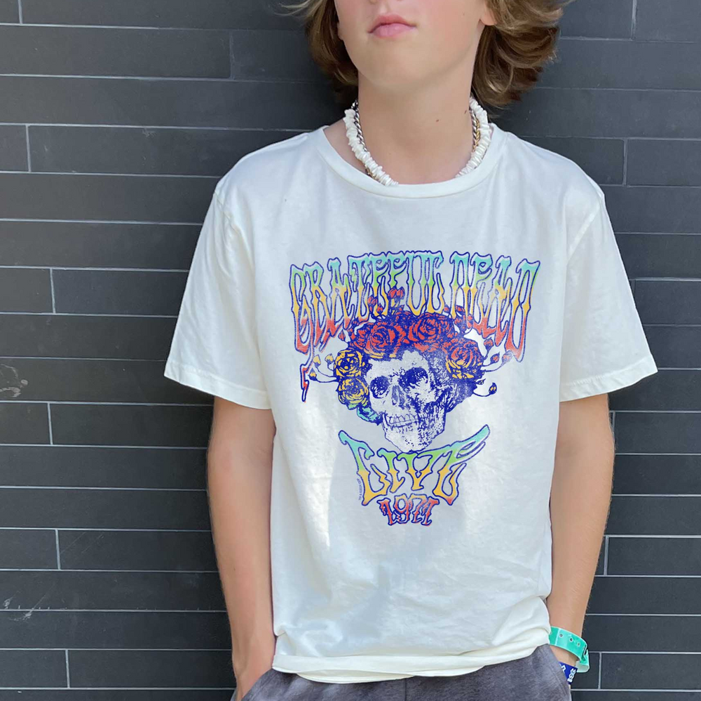 Grateful Dead Short Sleeve Tee in Vintage White a boy leaning back on a wall