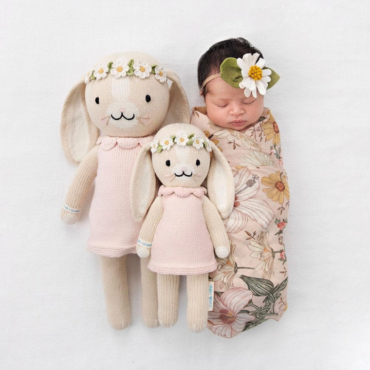 a baby with Hannah the Bunny in Blush