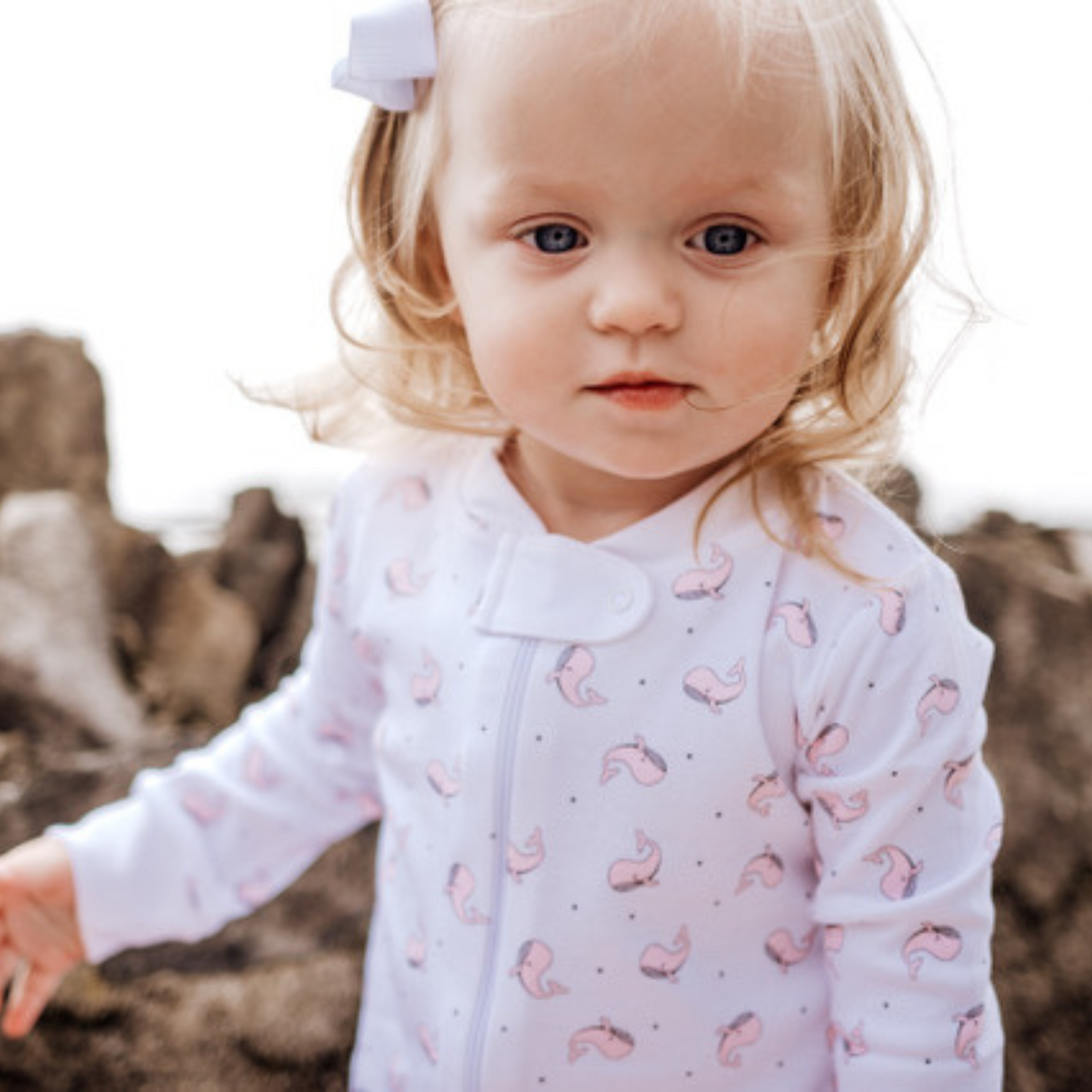 a baby wearing Happy Whale Pajama Set in Pink