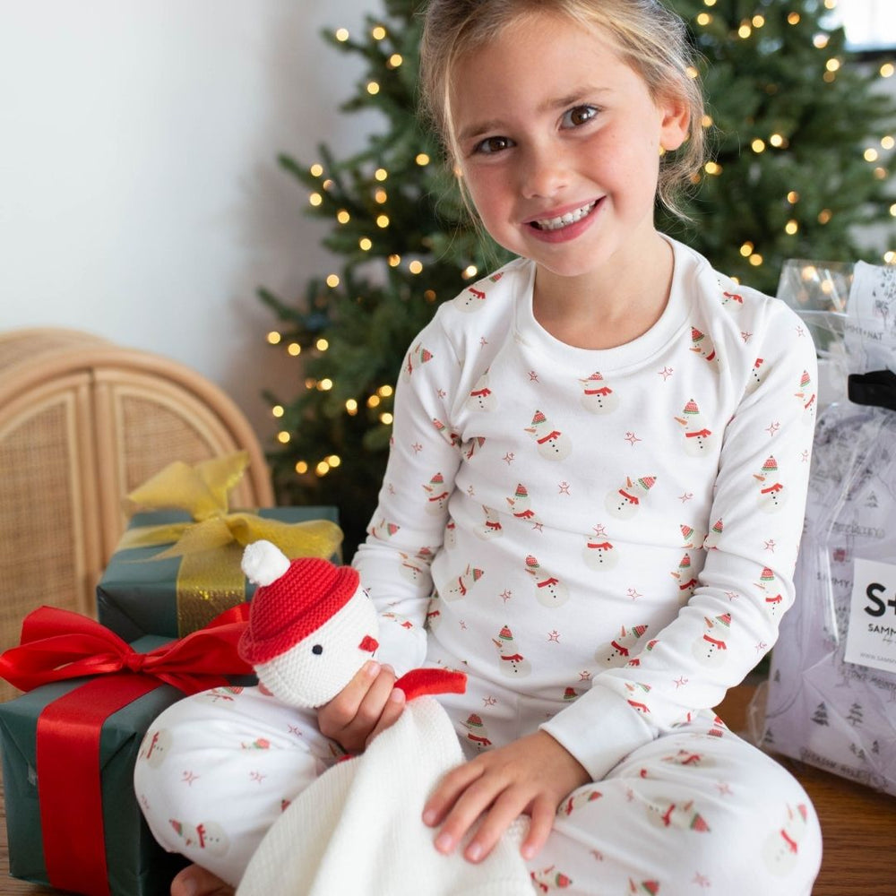 a girl wearing Vintage Snowman Pajama Set