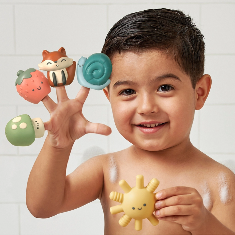 a little boy playing Itzy Bitzy Puppets