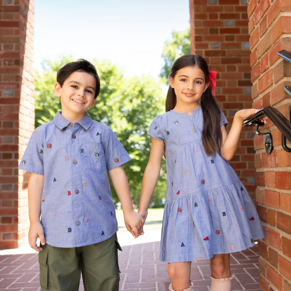 a boy wearing Jack Shirt - Varsity Embroidery