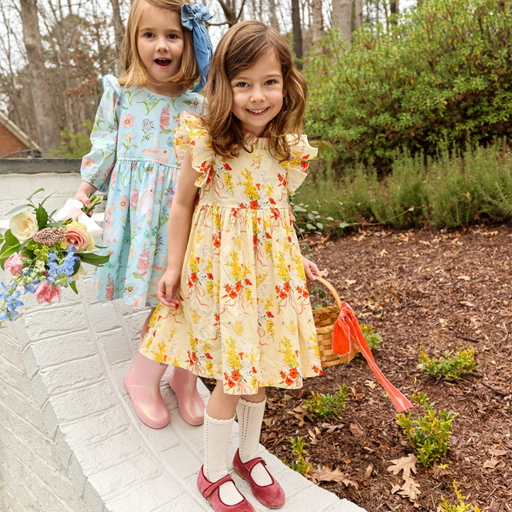 a girl wearing Jennifer Dress - Yellow Chicks