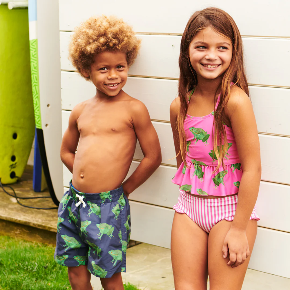 a girl wearing Joy Tankini - Magenta Pink Frogs