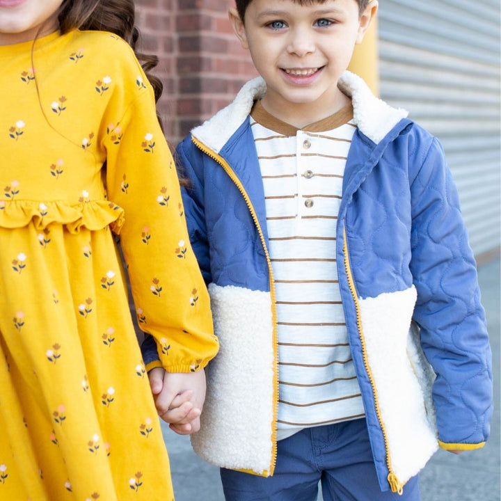 boy wearing kennedy jacket