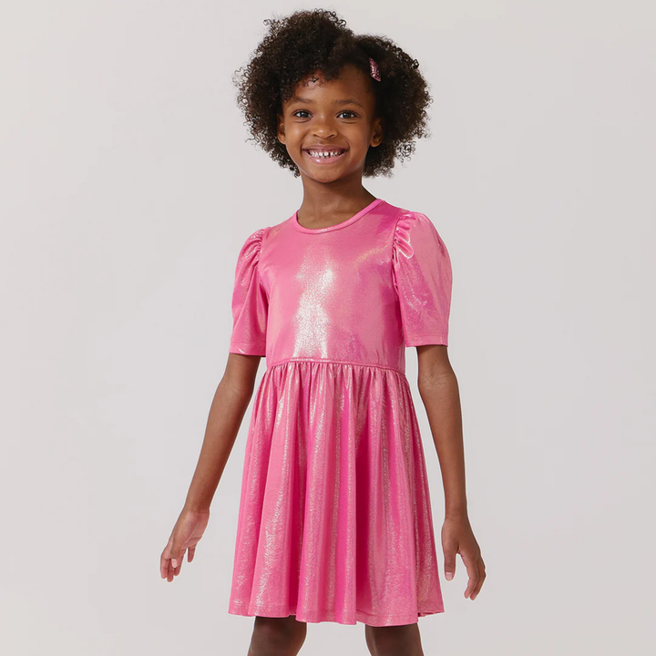 a girl wearing Lame Laurie Dress - Pink