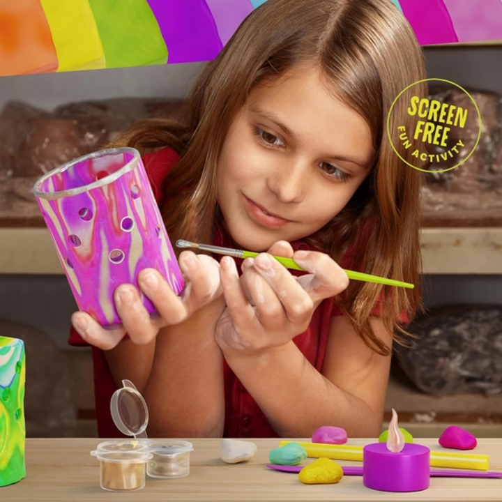 a girl making Light-up Clay Lanterns Making Kit