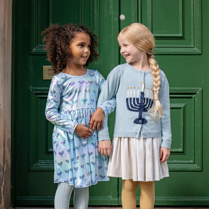 little girl wearing Maude Sweater - Blue Menorah