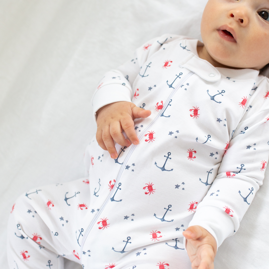 a baby wearing Nautical Crab Zipper Romper