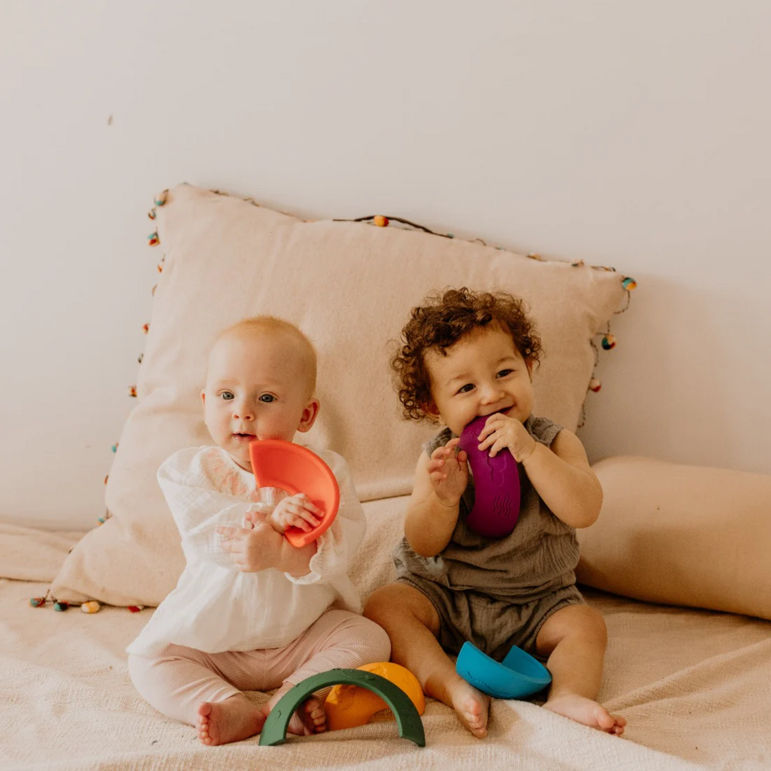 babies playing Over the Rainbow Stacking Arches - Bright