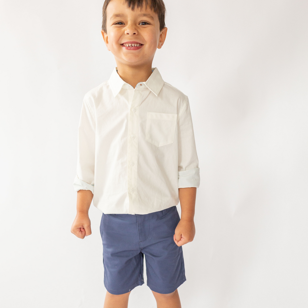 a little boy wearing Perry Poplin Buttondown in Angel White