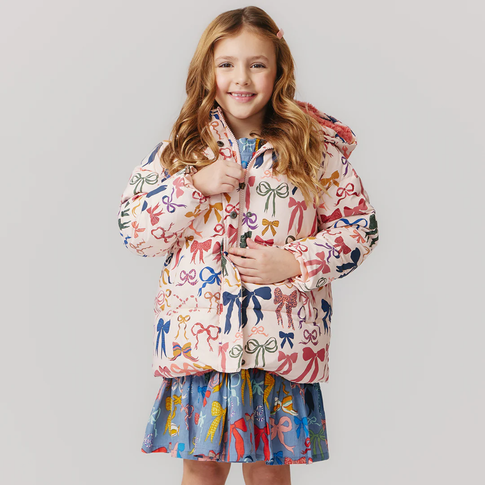 a girl wearing Pete Puffer - Bows on Bows Pink